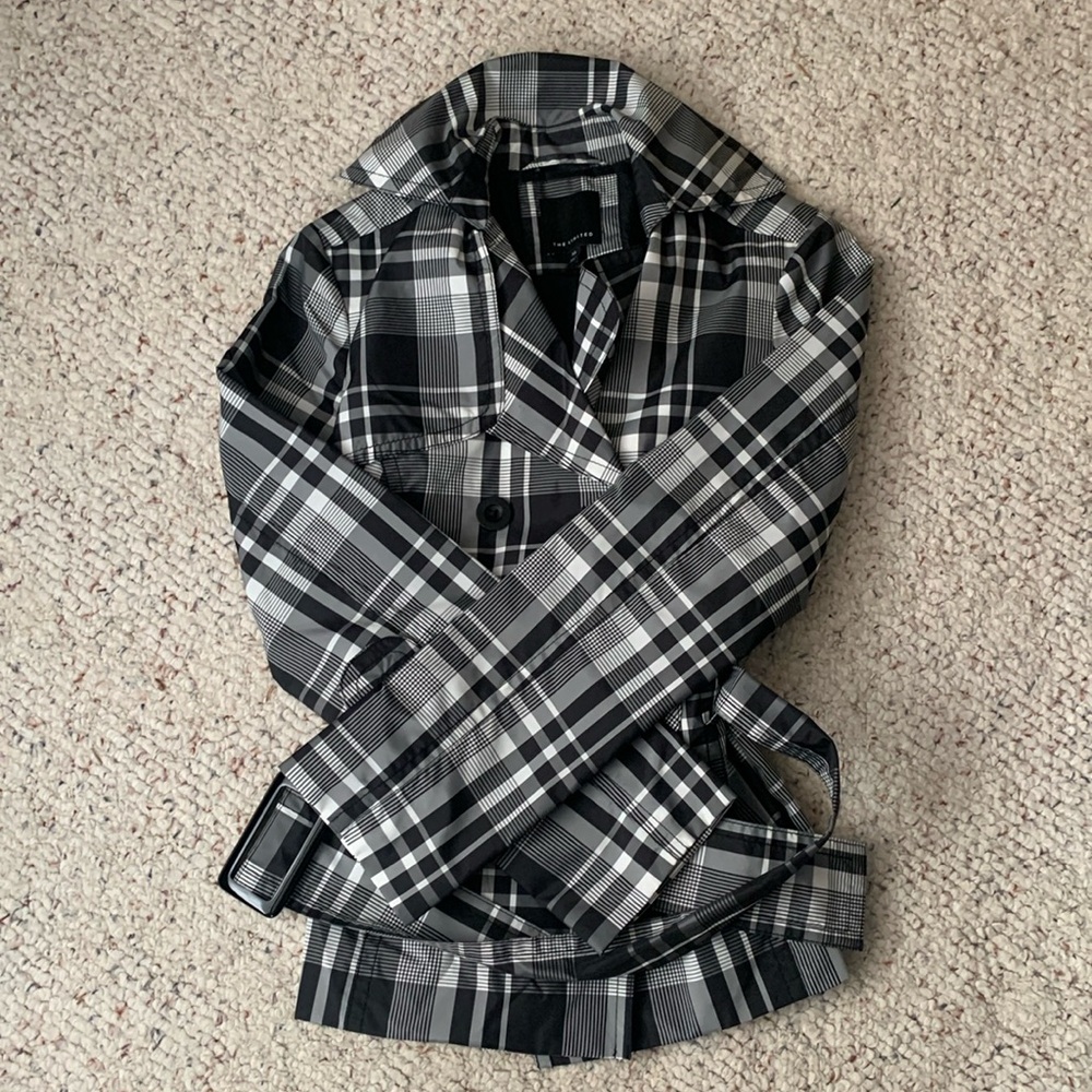 Barely worn cute and stylish black plaid raincoat!